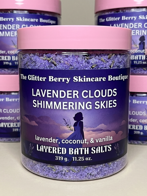 Lavender Clouds & Shimmering Skies Bath Salts by The Glitterberry Boutique. This luxurious, professional-grade bath soak is meticulously crafted to offer an immersive, spa-like experience. ( Includes a free gift while supplies last!)