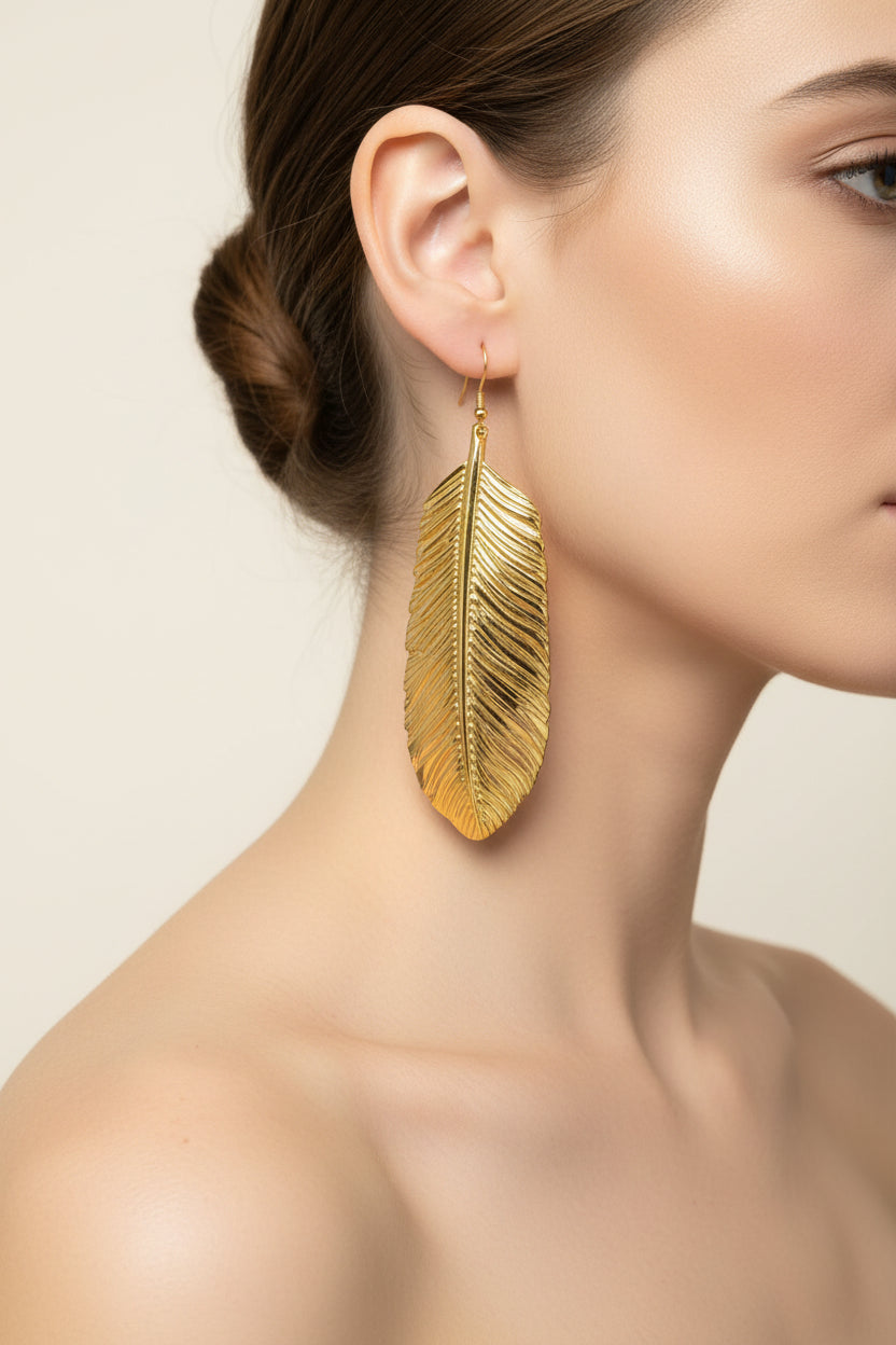 "HEY QUEEN" gold metallic feather earrings